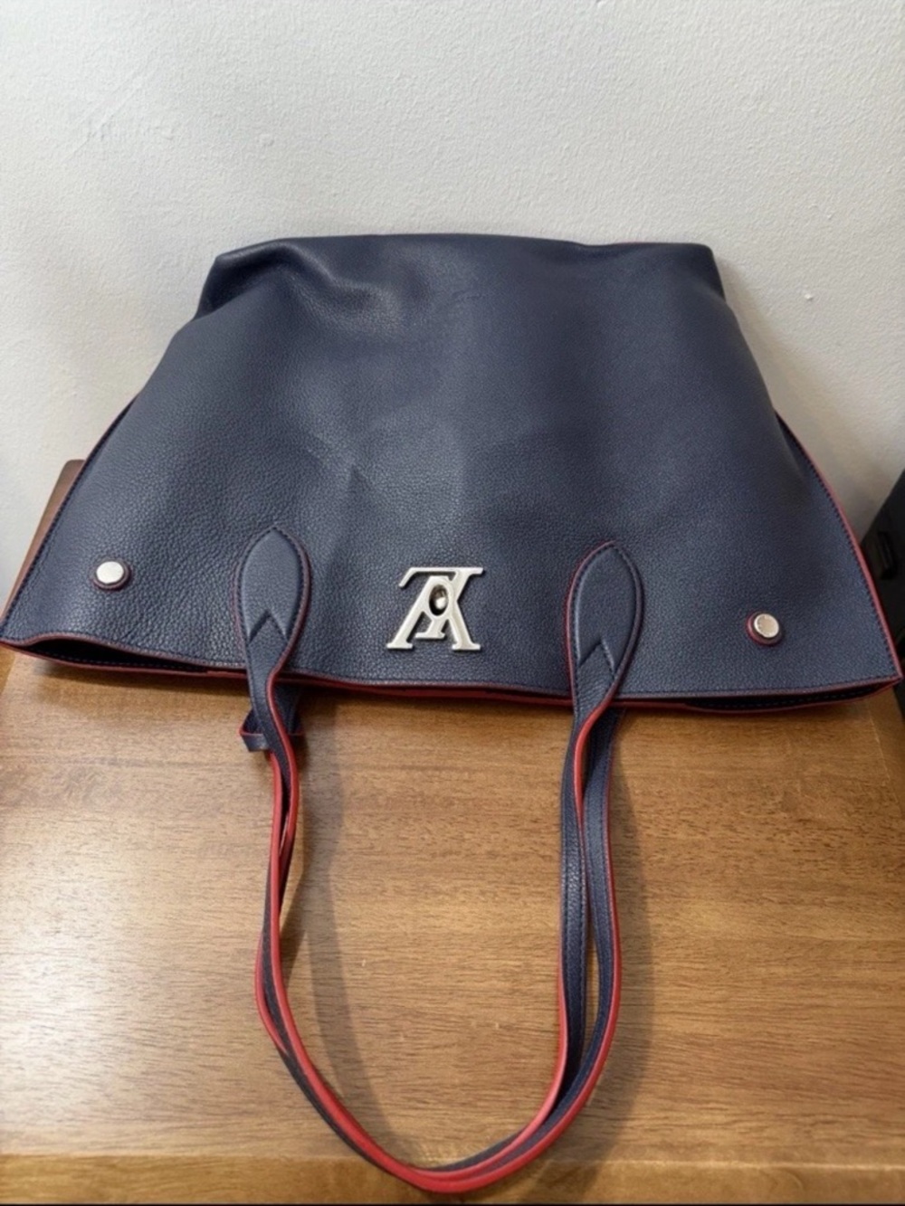 Louis Vuitton Navy Tote with Red Trim and Silver Logo